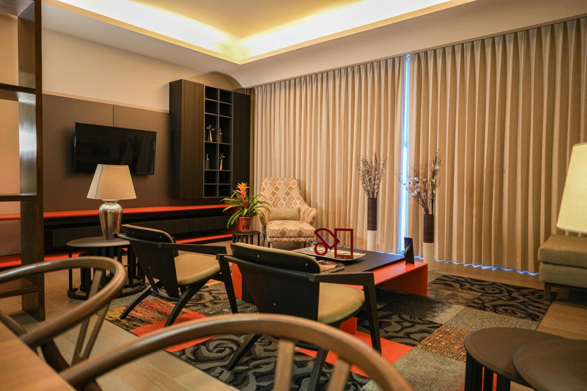 Metria Hotel Леон Екстериор снимка A living room in a condominium
